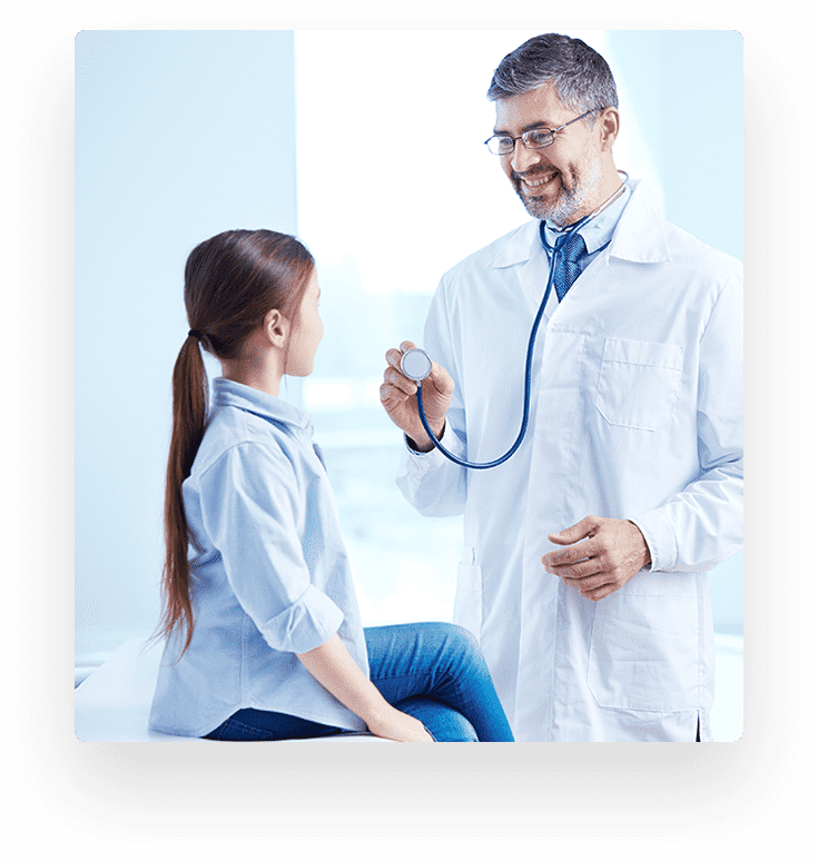 Doctor examining young patient